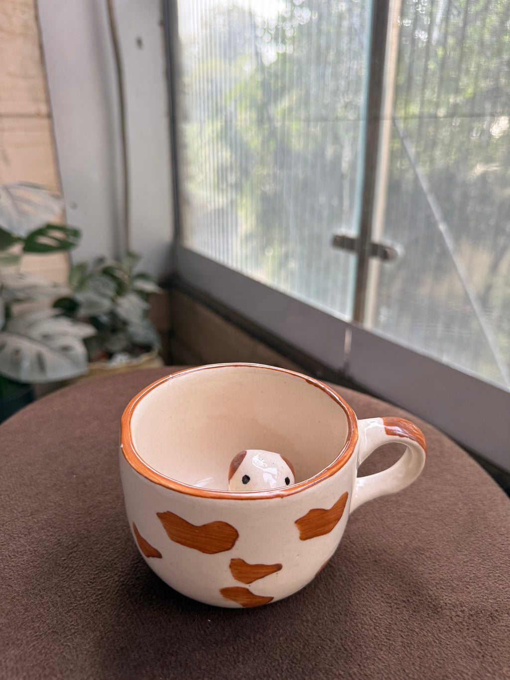 Dog inside Mug