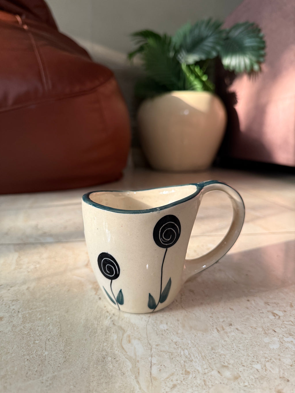 Curved Mug with floral detailing