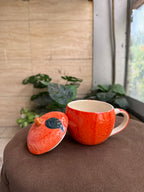 Orange mug with lid