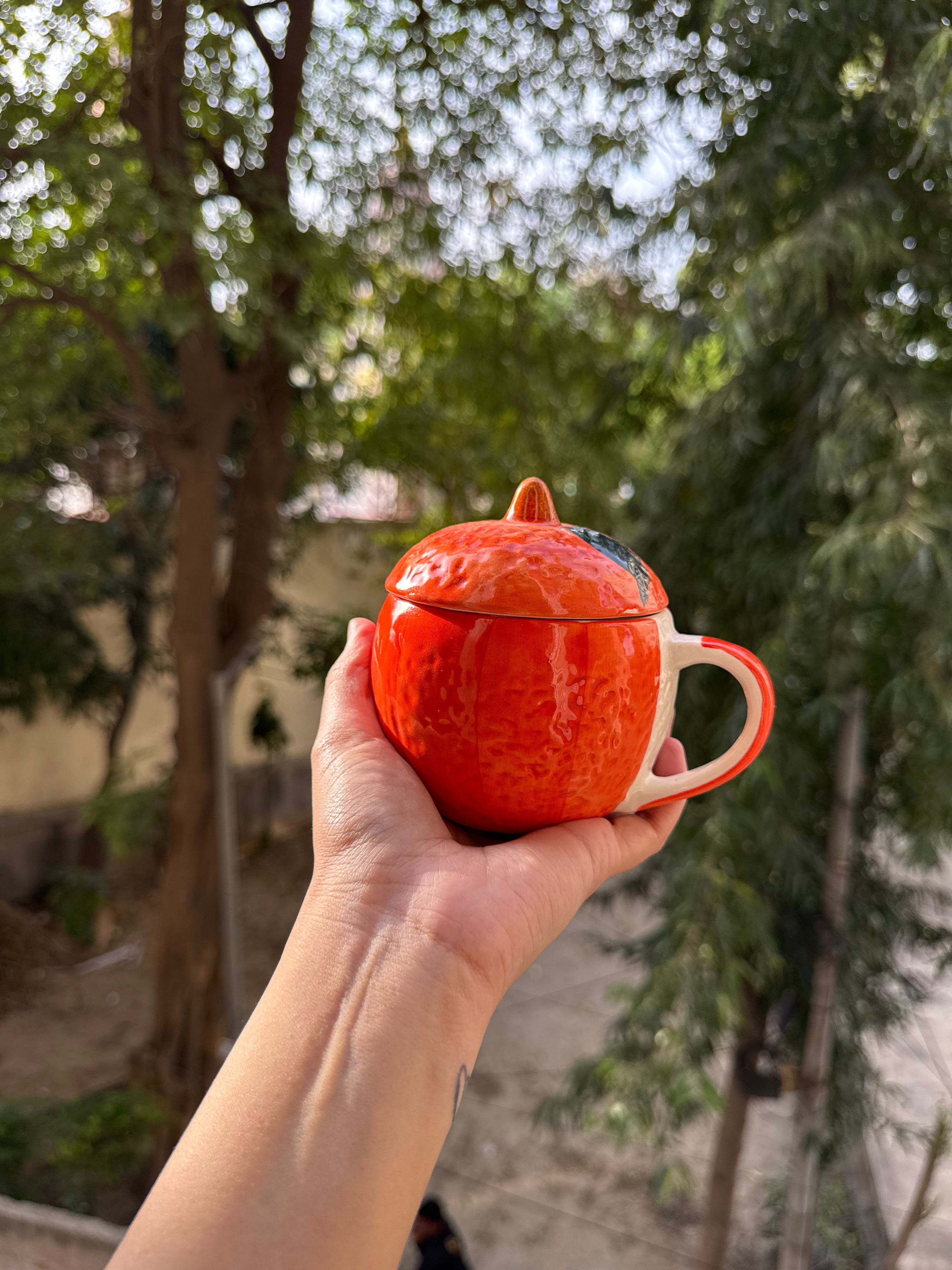 Orange mug with lid